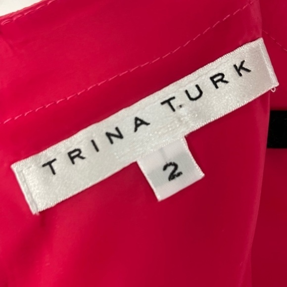 TRINA TURK YARROW SLEEVELESS DROP WAIST NOTCH NECK RUFFLE HEM DRESS - Picture 9 of 11